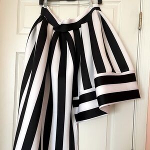 High Low Black & White Plus Size Skirt Sizes Available are 2(3X) and 1(2X).